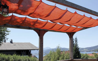 Compara una vela de sombra con una pérgola